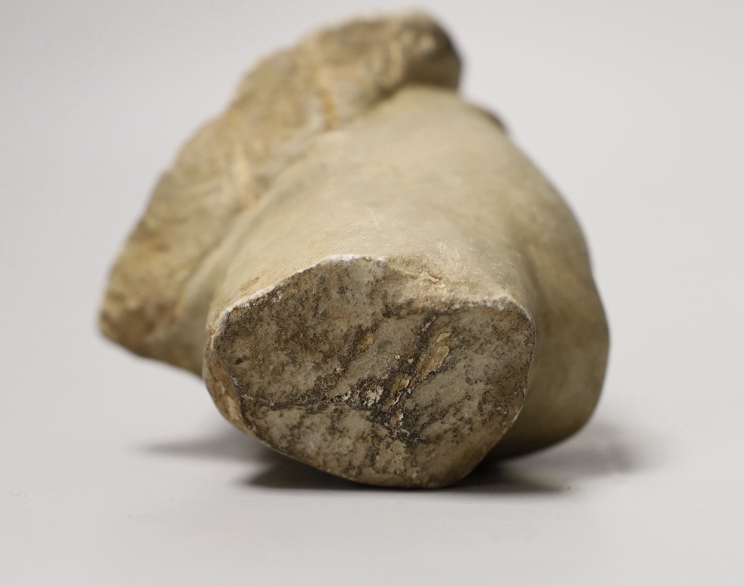 A marble head of a man in Hellenistic style, 12cm long